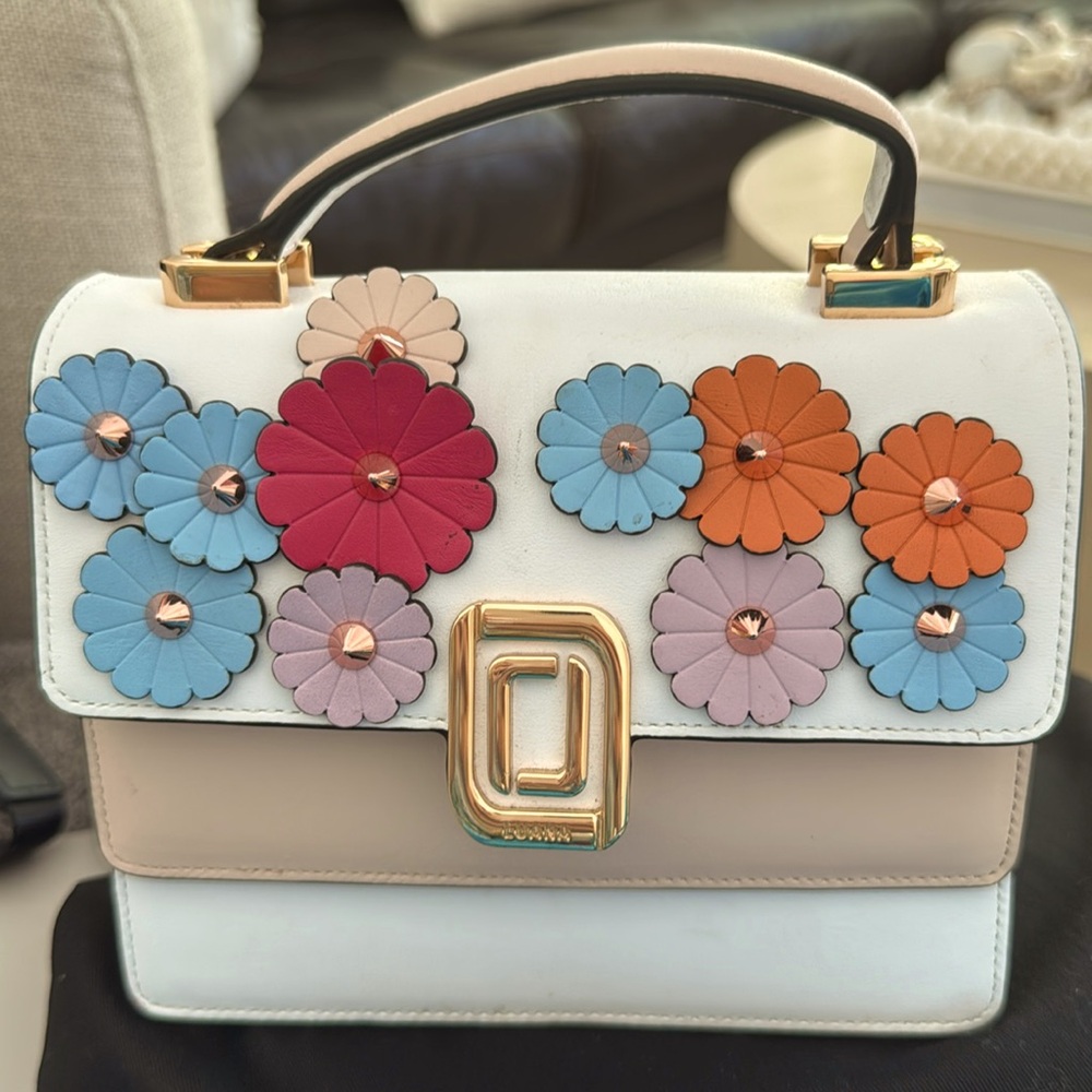 Luana cross body or clutch removable straps in mint condition.